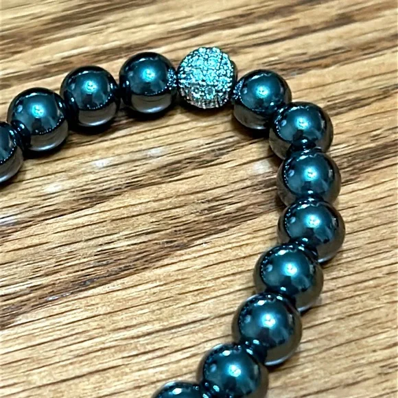 Hematite bracelet with pave crystal bead. NWOT. Comes in box. - Picture 3 of 4